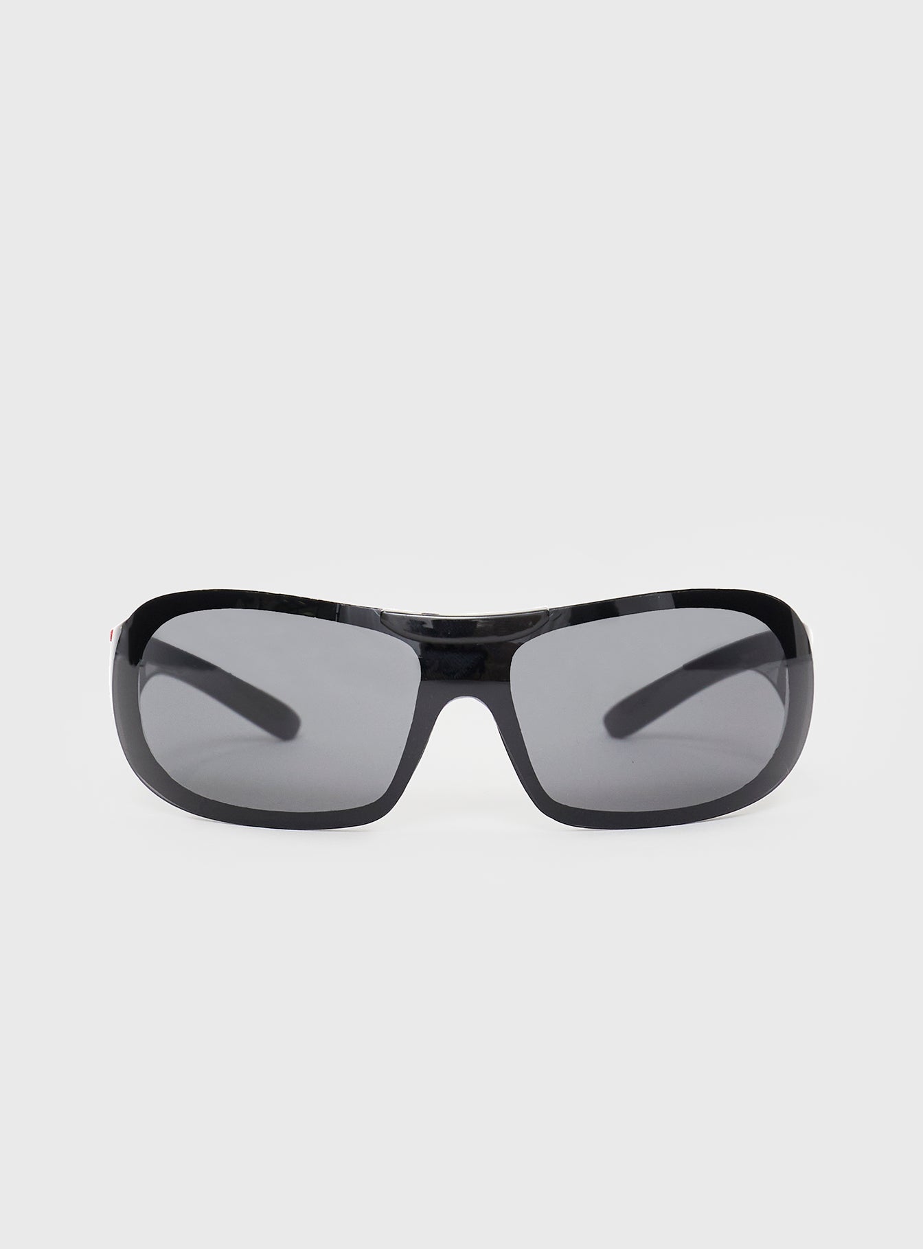 Sunglasses Molded nose bridge, smoke tinted lens, thick arms with red detail