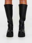 Knee High Boots Platform base, round toe, block heel, padded footbed Zip fastening at side