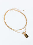 Gold-toned necklace Two fixed chains - these cannot be worn separately, drop charms, lobster clasp fastening