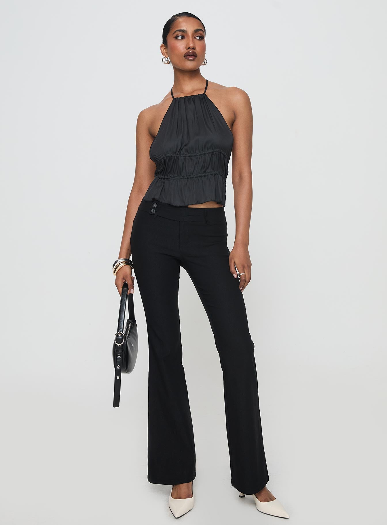 front view of model wearing Princess Polly Legacy Halter Top Onyx Sleeveless High Neck 