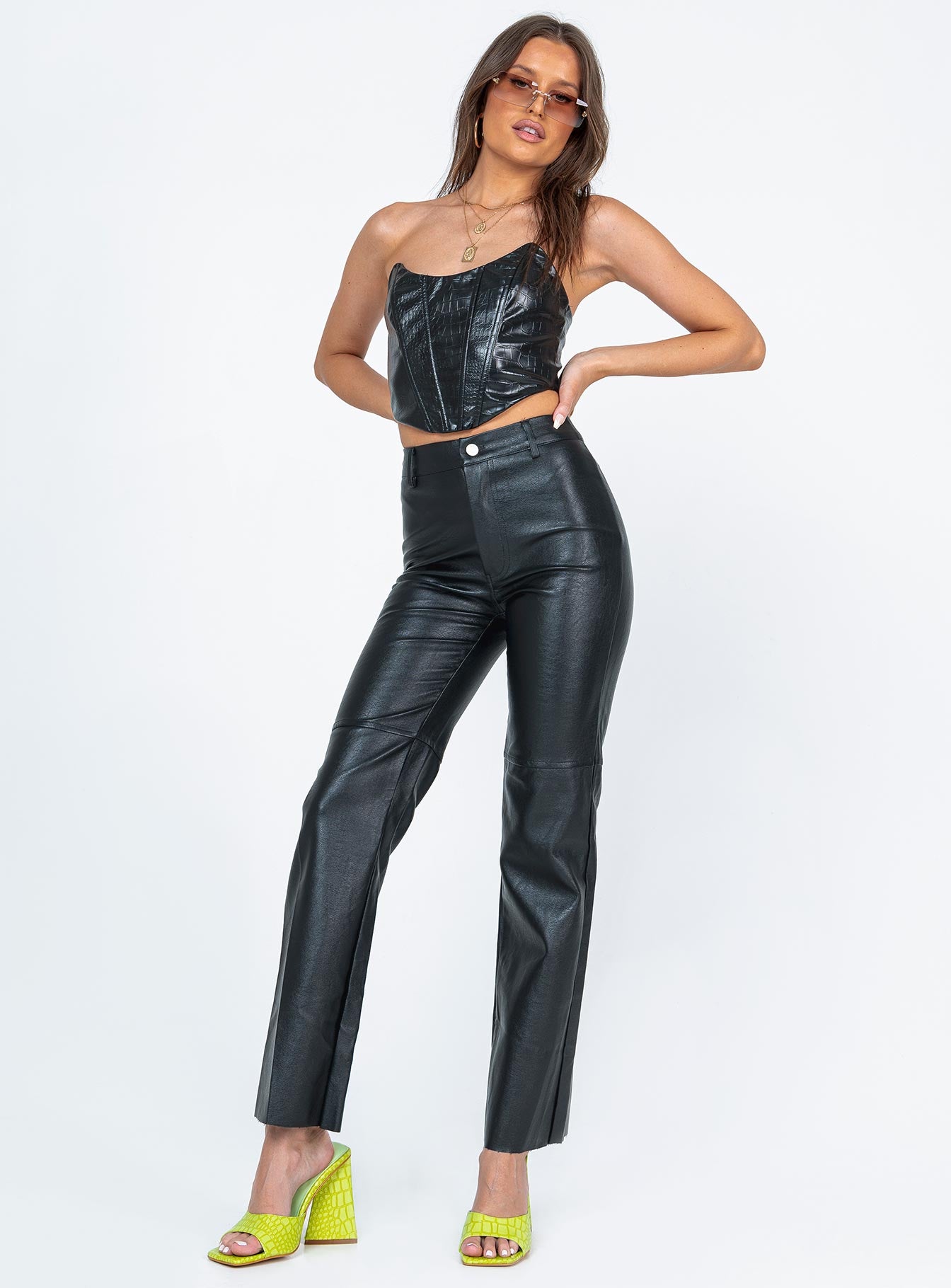 front view of model wearing Princess Polly Macey Pants Black Petite High Waisted Pants 