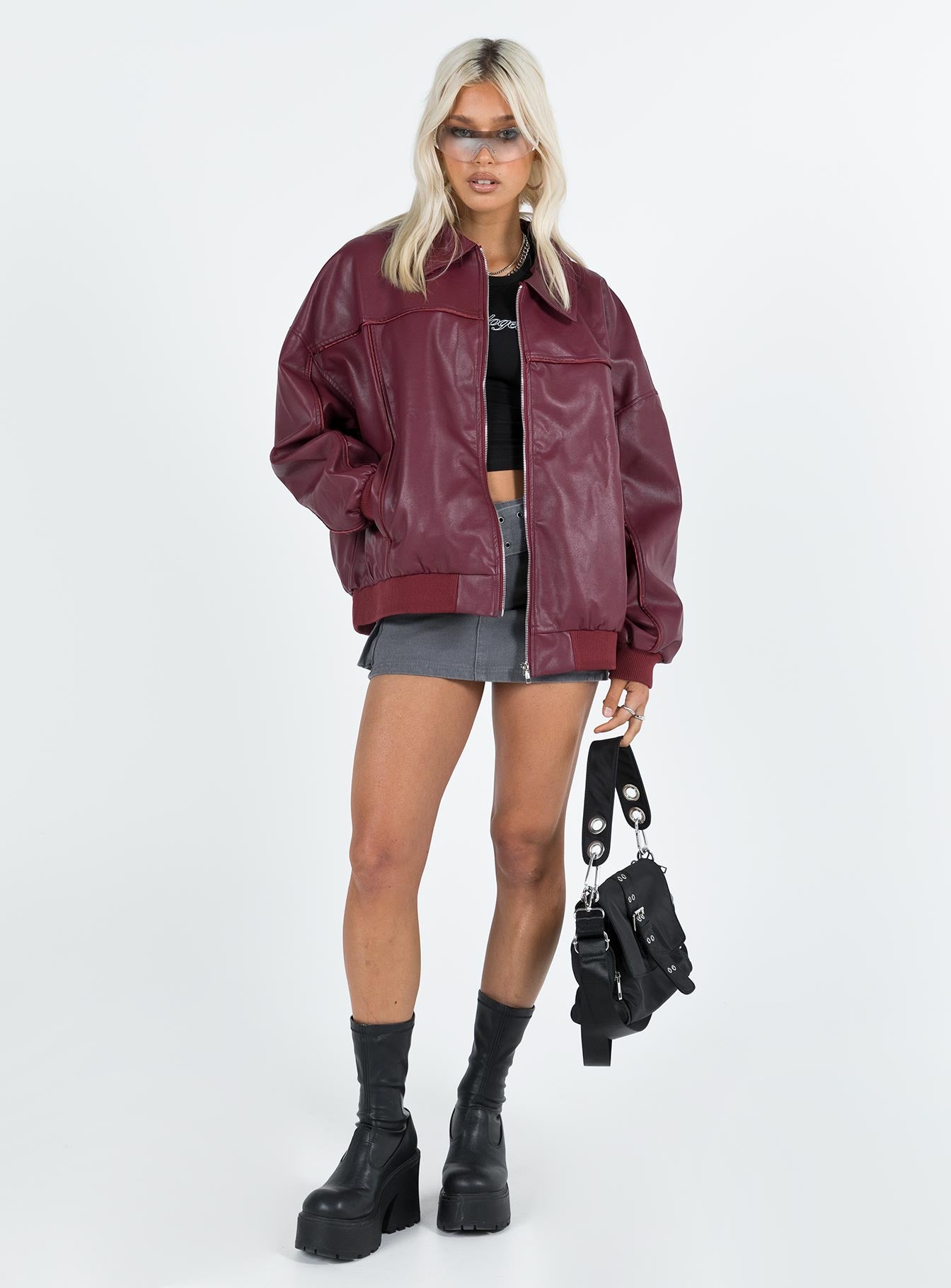 Burgundy bomber jacket Faux leather material  Classic collar  Zip front fastening  Ribbed waistband and cuffs  Twin hip pockets