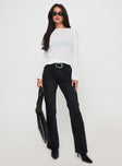 front view of model wearing Princess Polly Kemsley Mid Rise Bootleg Jeans Washed Black Mid Rise 