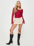 Red Long sleeve top Inner silicone strip at bust, boning through waist, zip fastening at back