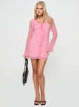 front view of model wearing Princess Polly Marisela Long Sleeve Mini Dress Pink V-Neck 