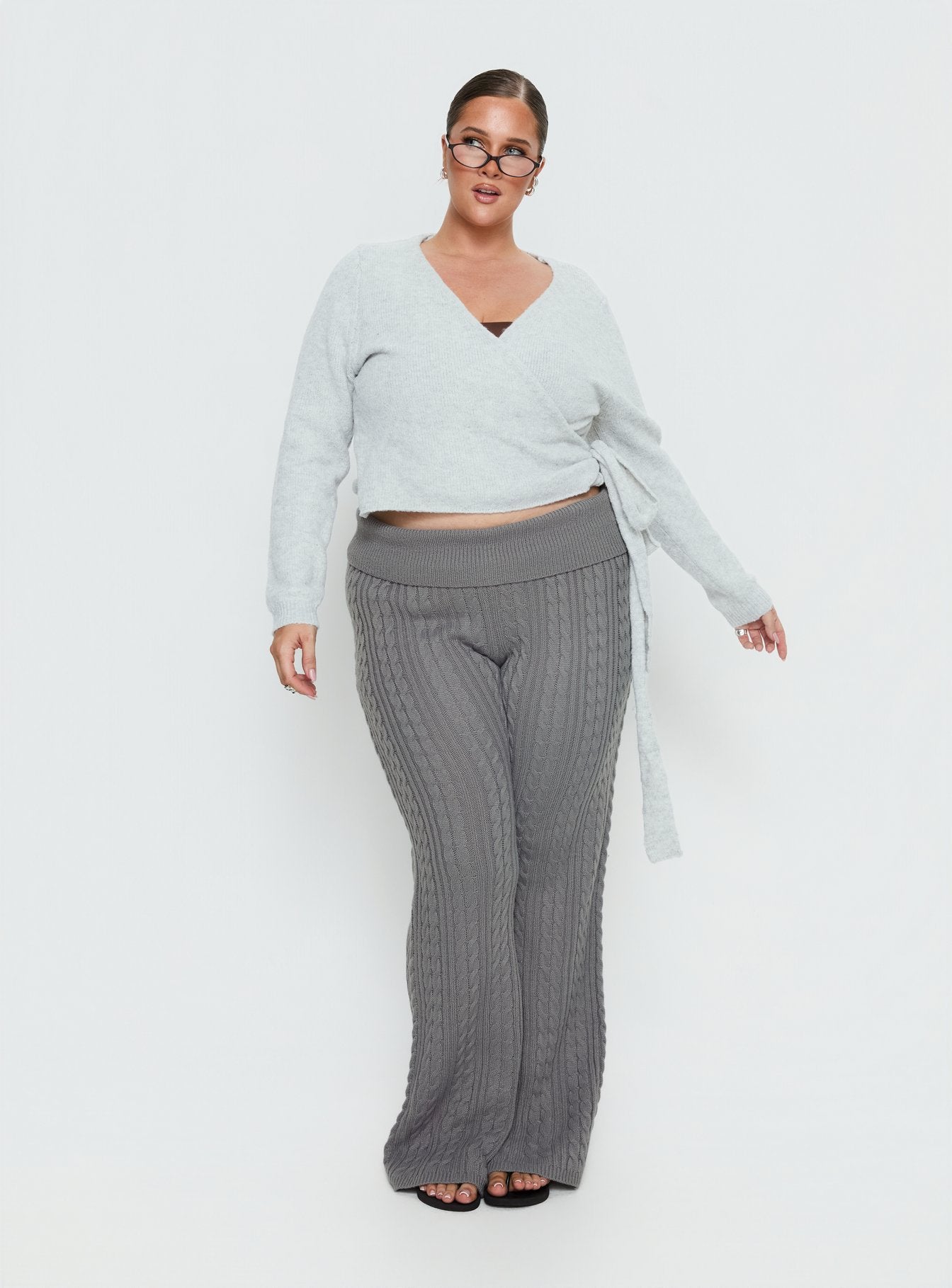 back view of model wearing Princess Polly Tonee Wrap Knit Cardigan Grey Curve cropped 