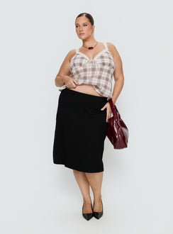   front view of model wearing Princess Polly Baseline Rib Midi Skirt Black Curve Midi Skirts 