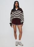 front view of model wearing Princess Polly Moreton Shorts Wine Low Rise Shorts 