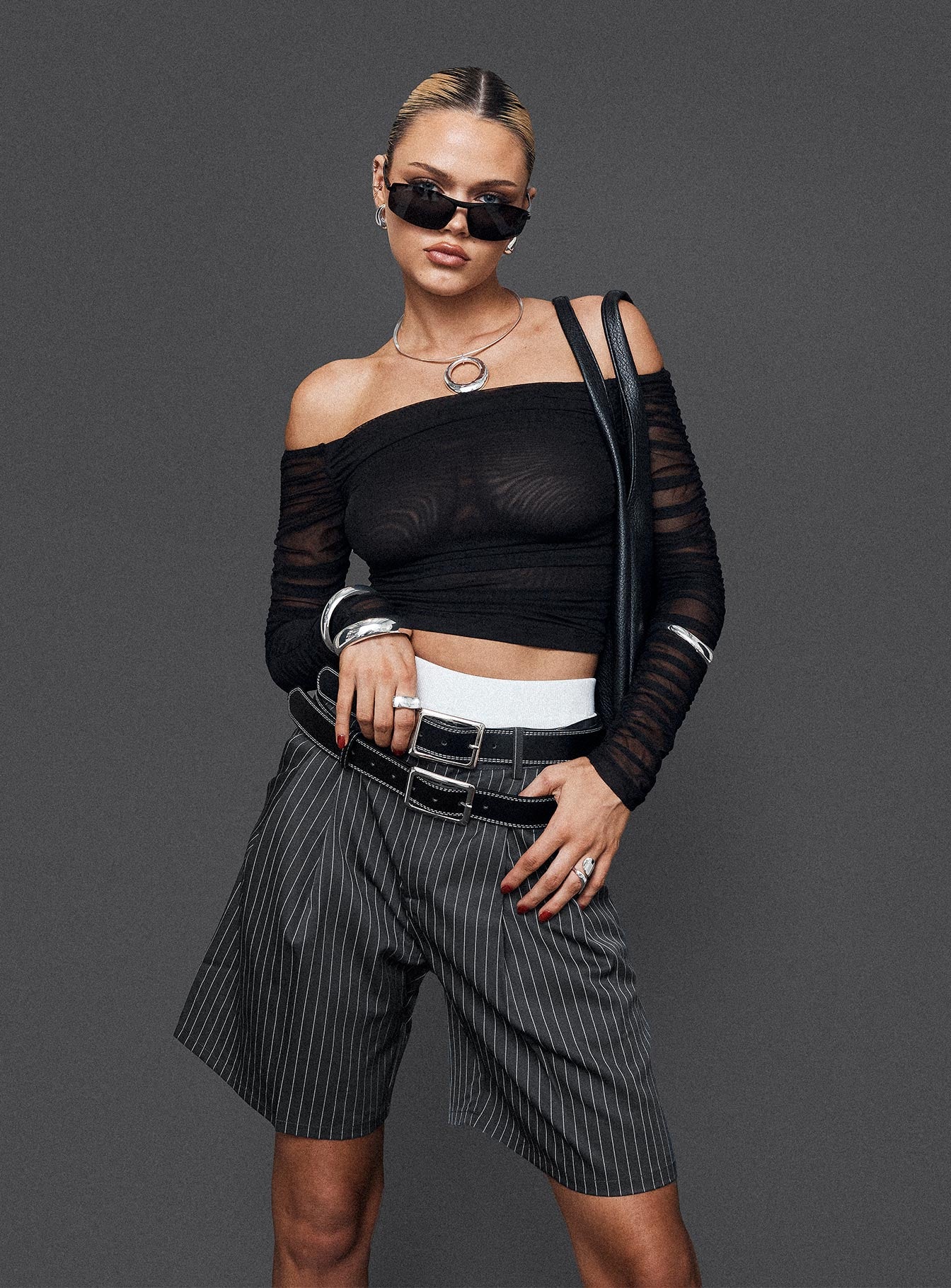 front view of model wearing Princess Polly In Office Longline Shorts Grey High Waisted Shorts 