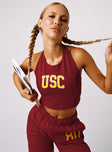 front view of model wearing Princess Polly USC Tailgate Top Cardinal Red Sleeveless Crew Neck 