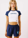 front view of model wearing Princess Polly USD Homerun Tee Navy / White Short Sleeves Crew Neck 