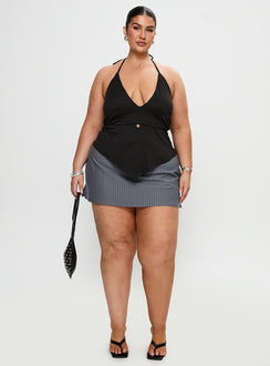 front view of model wearing Princess Polly Averee Halter Top Black Curve Sleeveless Plunger 