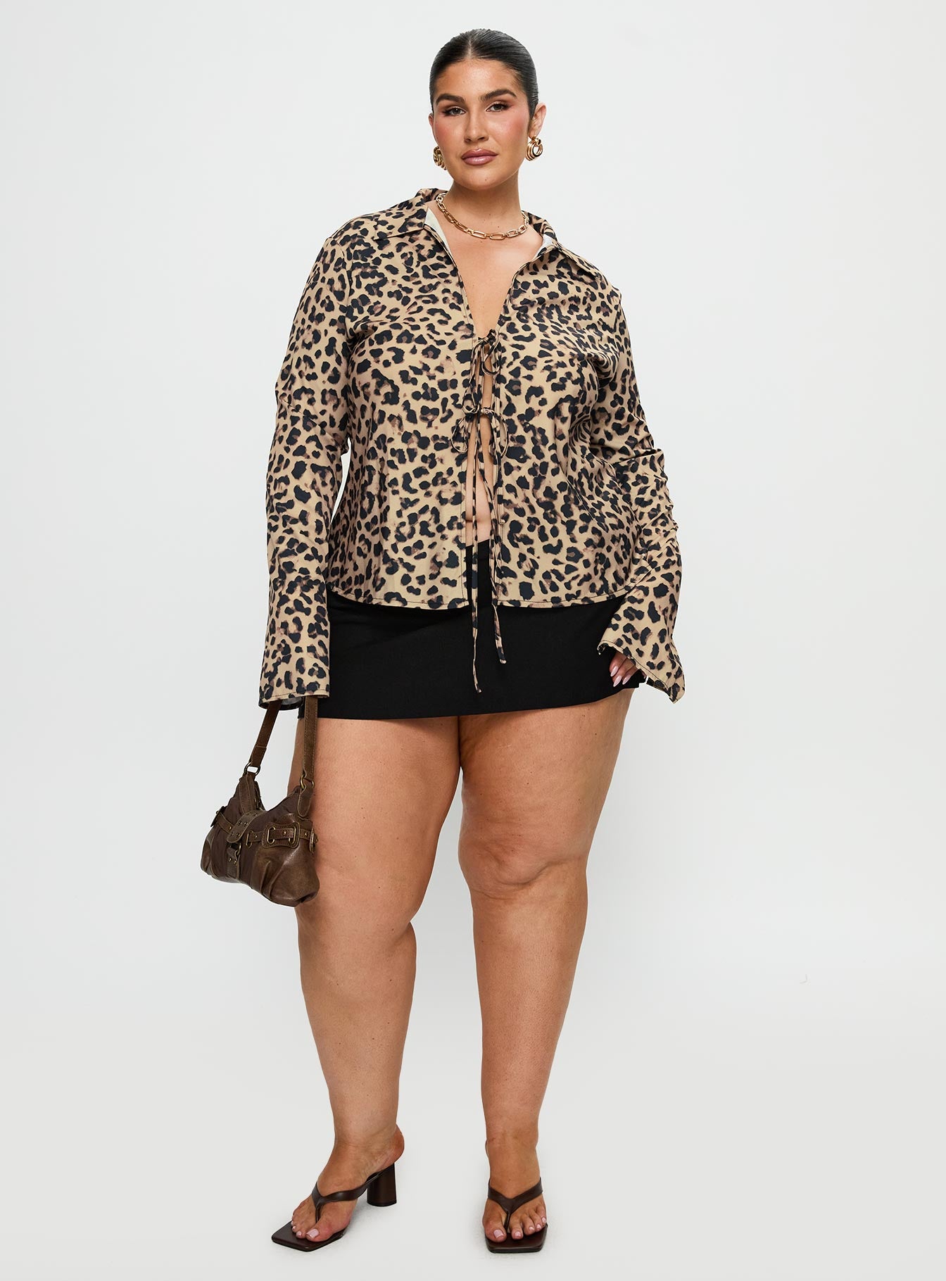 front view of model wearing Princess Polly Toriah Long Sleeve Tie Up Top Leopard Curve Full Sleeves V-Neck 