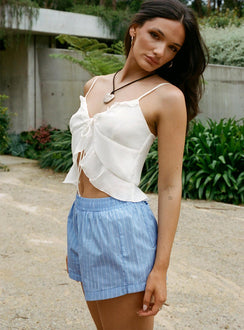 side view of model wearing Princess Polly Maxxy Boxer Shorts Blue Stripe High Waisted Shorts 