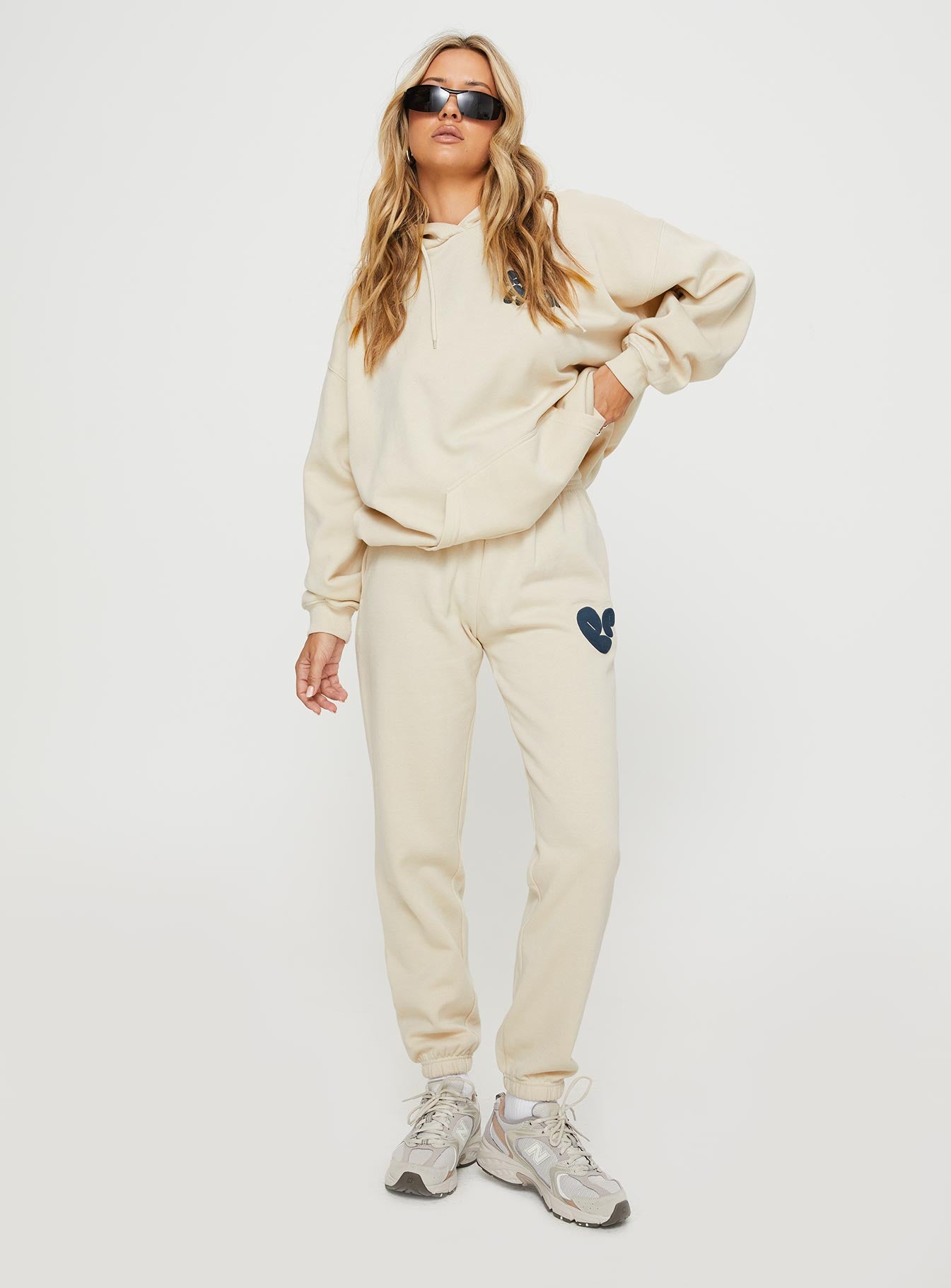 front view of model wearing Princess Polly Princess Polly Hooded Sweatshirt Bubble Text Stone / Slate Long 