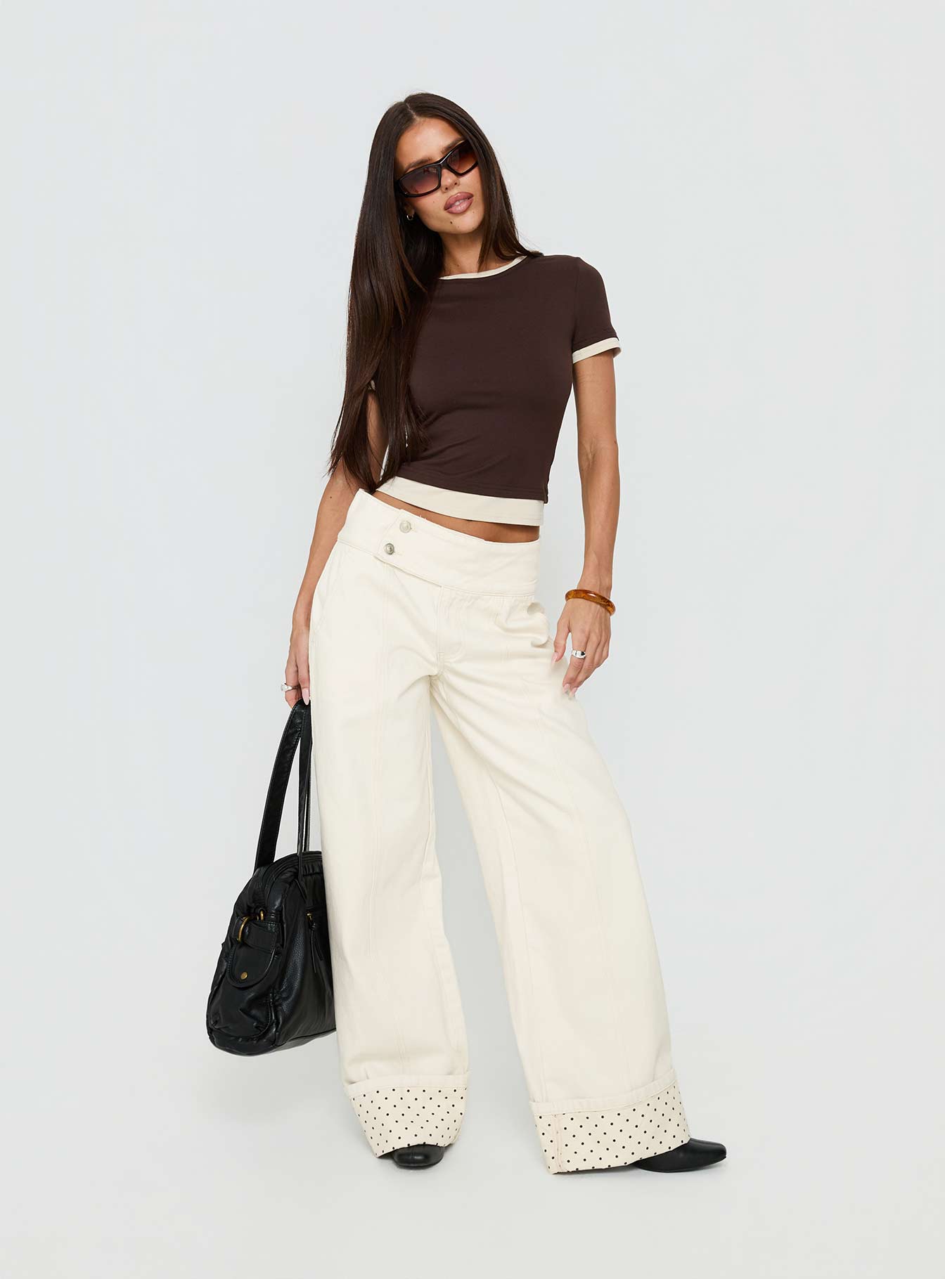 front view of model wearing Princess Polly Nikoletta Foldover Jeans Cream / Polka Mid Rise Jeans 