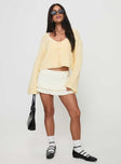 front view of model wearing Princess Polly Artha Cardigan Lemon Cropped 