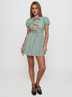 front view of model wearing Princess Polly Nurture Bow Mini Dress Green Stripe Crew Neck 