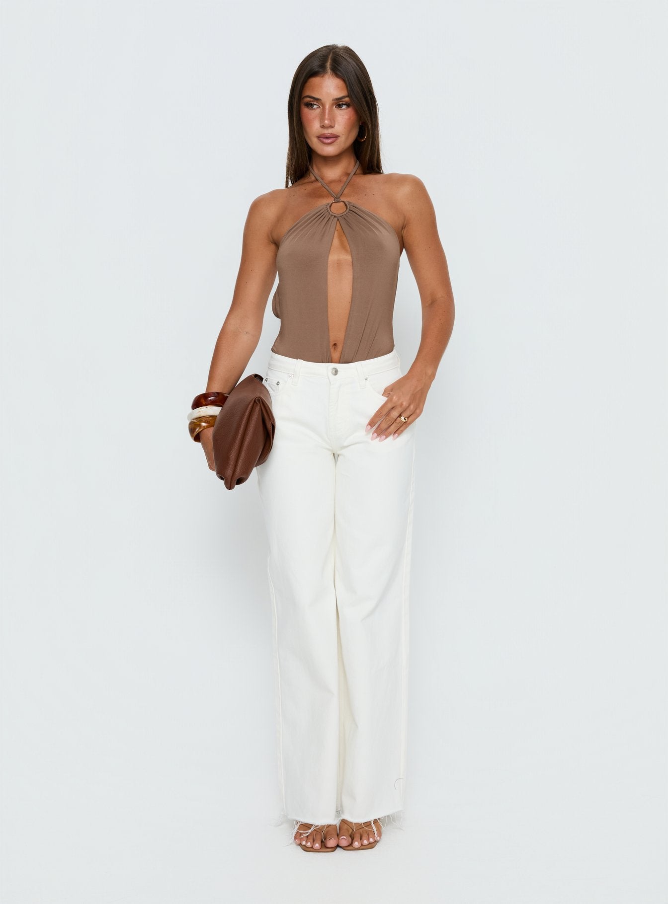 side view of model wearing Princess Polly Damiana Cut Out Bodysuit Brown Sleeveless 