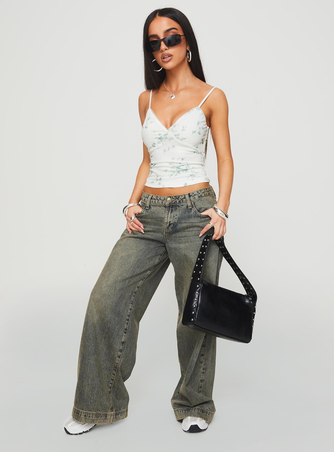 side view of model wearing Princess Polly Bulan Top Multi Sleeveless V-Neck 