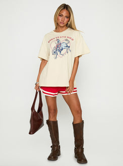 front view of model wearing Princess Polly Born To Live Wild Graphic Top White Half Sleeves Crew Neck 