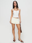 front view of model wearing Princess Polly Hatching Top White Sleeveless Sweetheart 