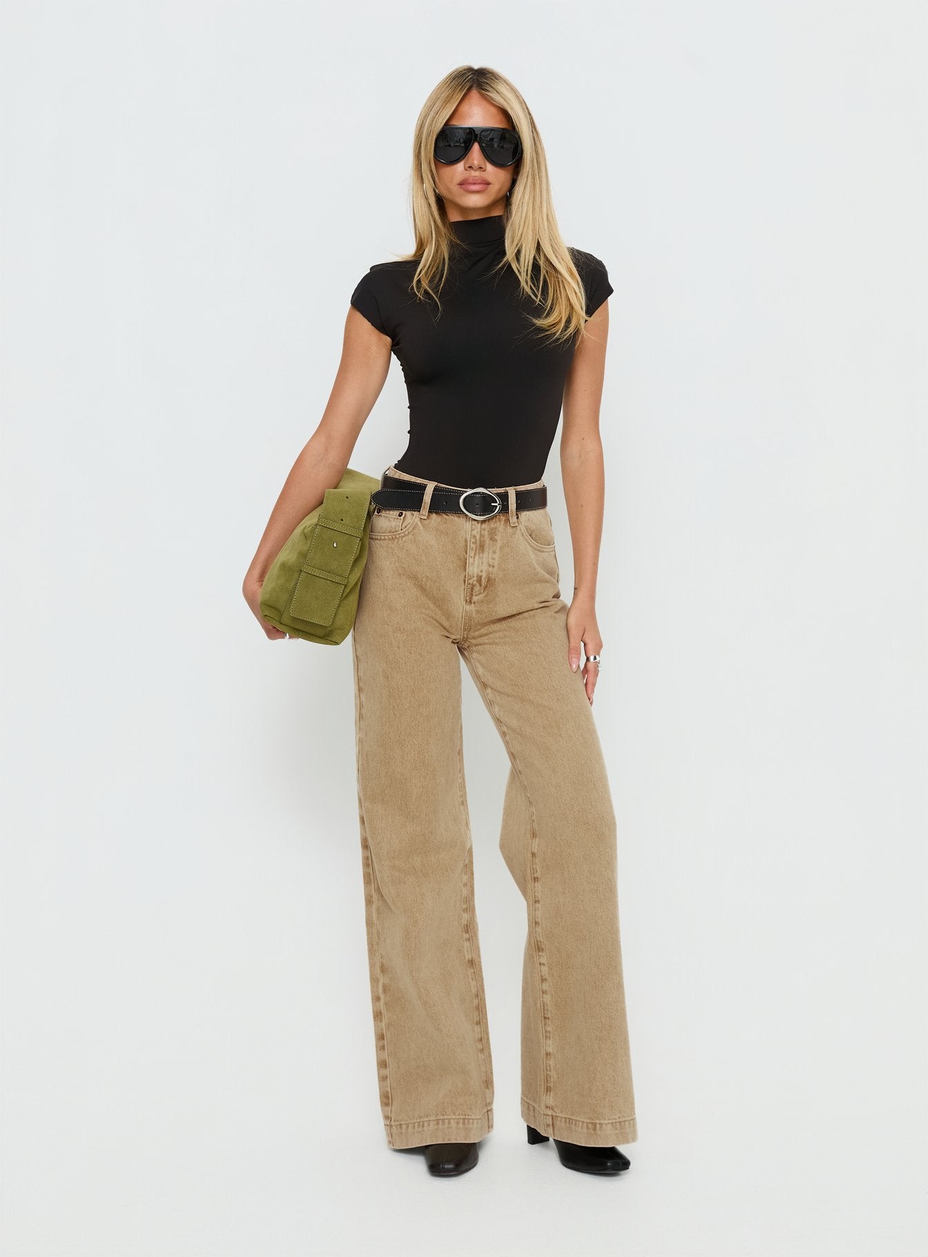front view of model wearing Princess Polly Goldie High Rise Wide Leg Jeans Tan High Rise Jeans 