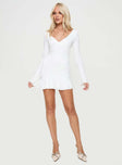 side view of model wearing Princess Polly Sybella Long Sleeve Mini Dress White V-Neck 