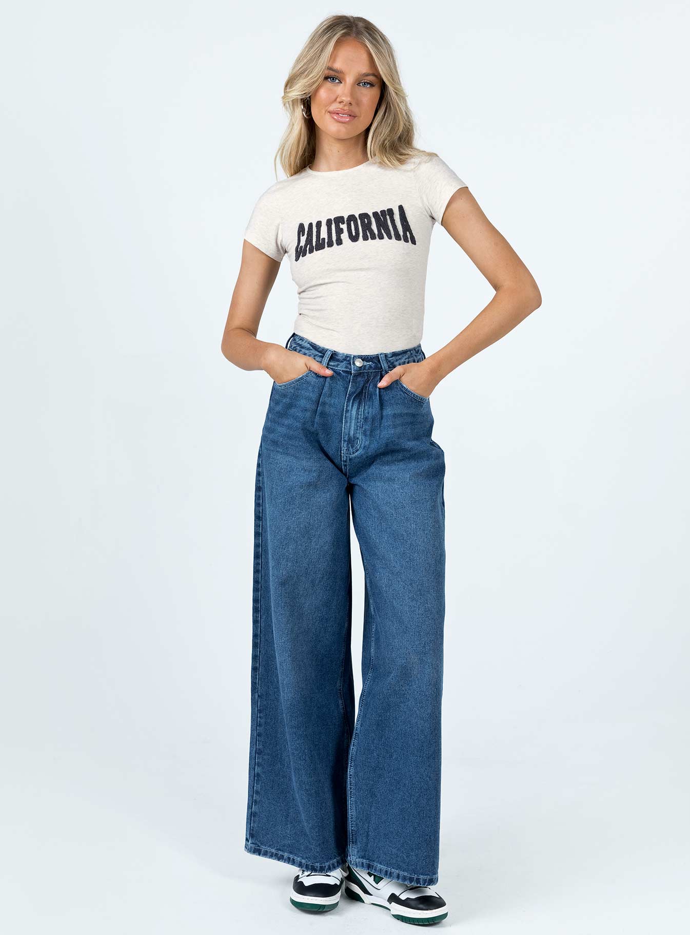 front view of model wearing Princess Polly Destination California Tee Grey Lower Impact Short Sleeves Crew Neck 