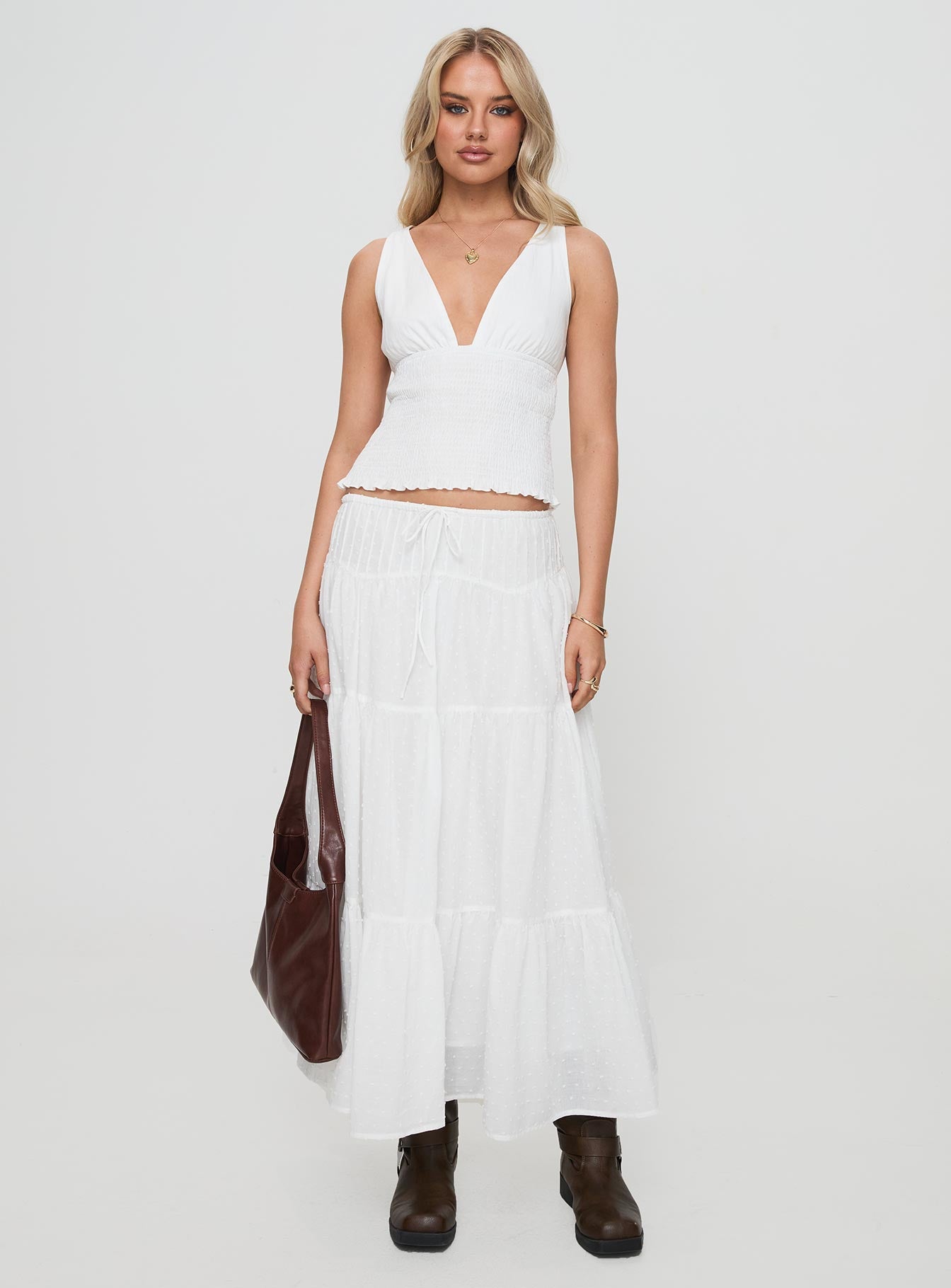 front view of model wearing Princess Polly Barletta Top White Sleeveless Plunger 