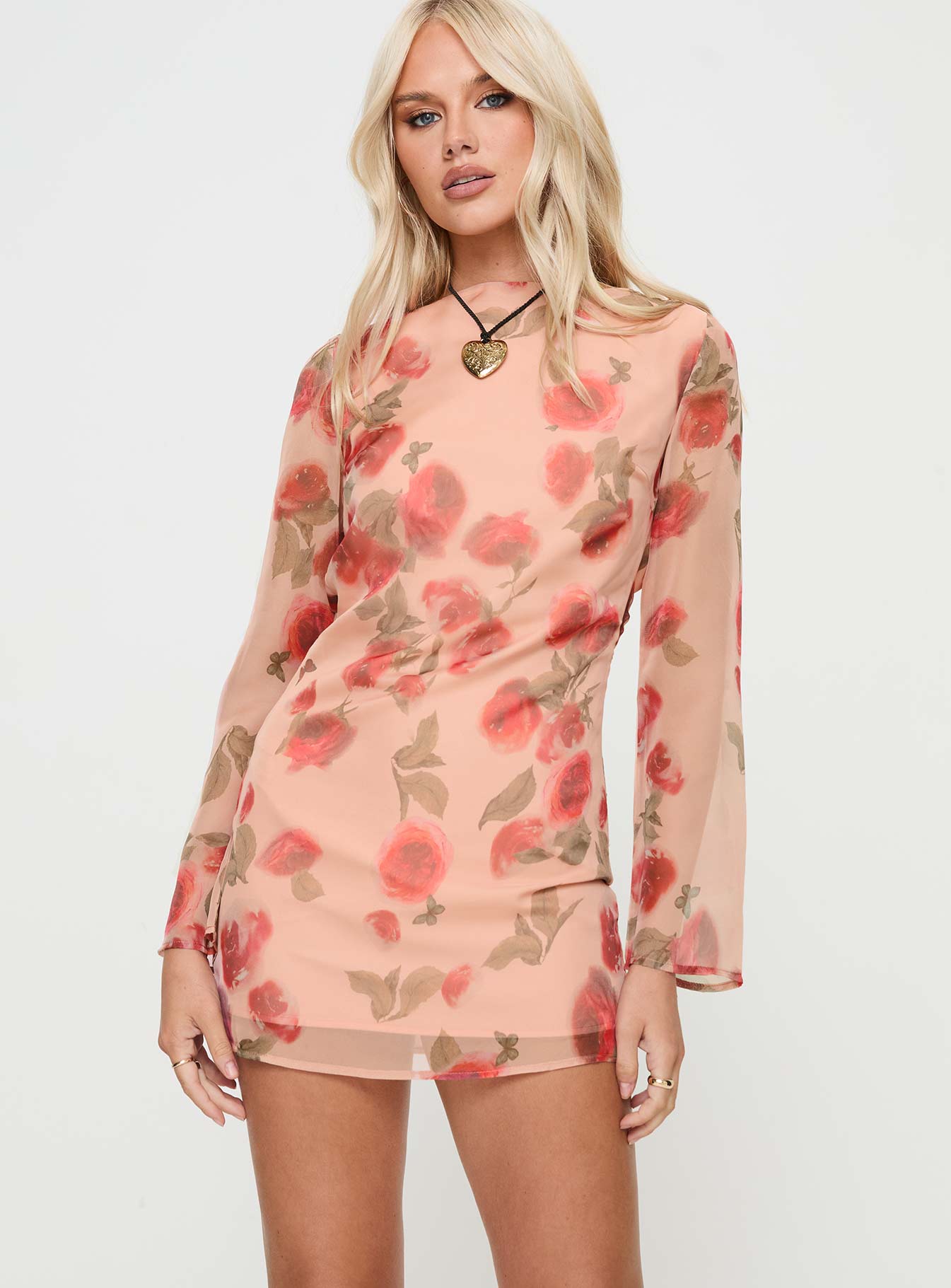 front view of model wearing Princess Polly Florinda Long Sleeve Mini Dress Pink Floral High Neck 