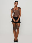 side view of model wearing Princess Polly Nerys Top Leopard Short Sleeves Square Neck 