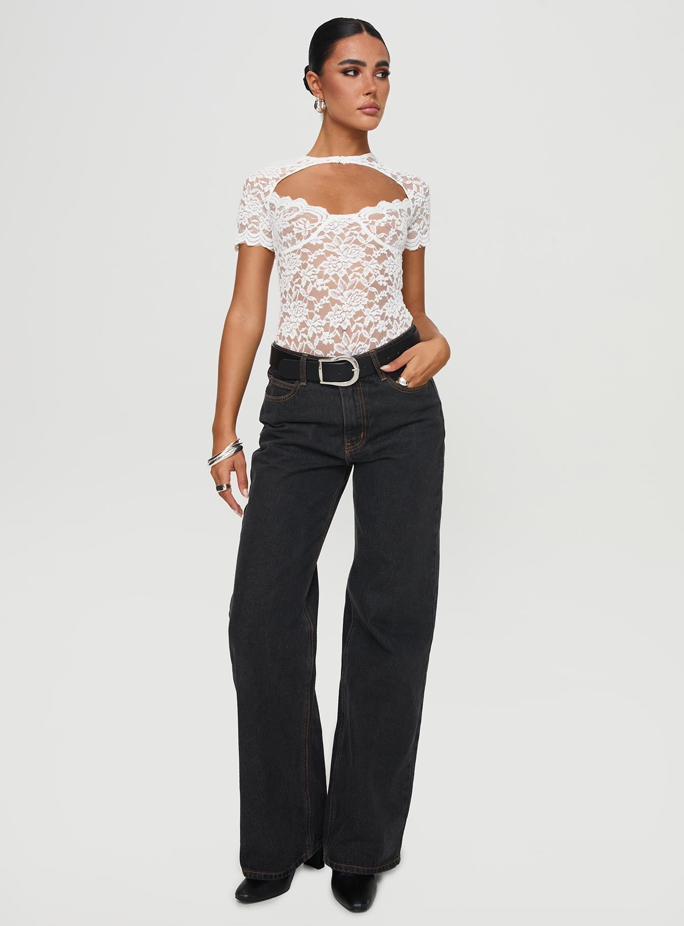 side view of model wearing Princess Polly Giallo Bodysuit White Short Sleeve 