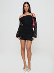 front view of model wearing Princess Polly Fable Off The Shoulder Mini Dress Black Straight Neck 