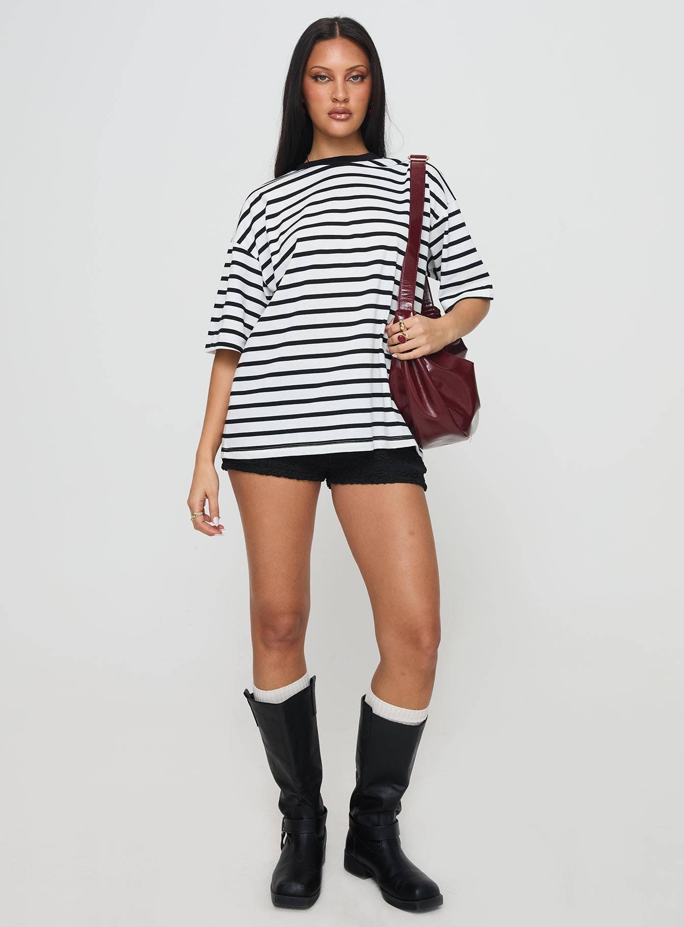 front view of model wearing Princess Polly Nersa Oversized Tee Black/white Stripe Half Sleeves Crew Neck 