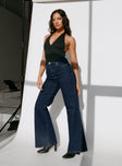 side view of model wearing Princess Polly Thearlie High Flare Jean Dark Wash High Waisted 