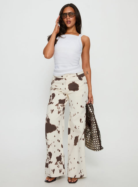 front view of model wearing Princess Polly Big Dreamer Low Rise Straight Leg Jeans Cow Print Low Rise Jeans 