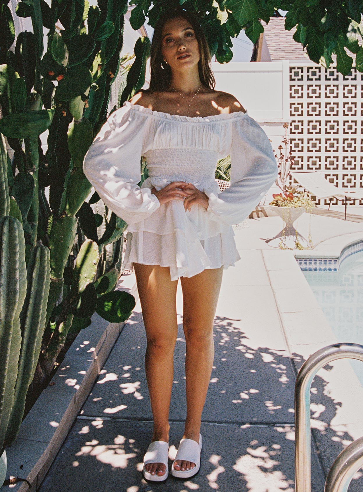 The love galore long sleeve romper white lower impact