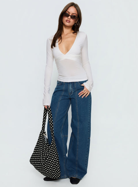 front view of model wearing Princess Polly Lando Low Rise Straight Leg Jeans Mid Blue Wash Mid Rise Jeans 