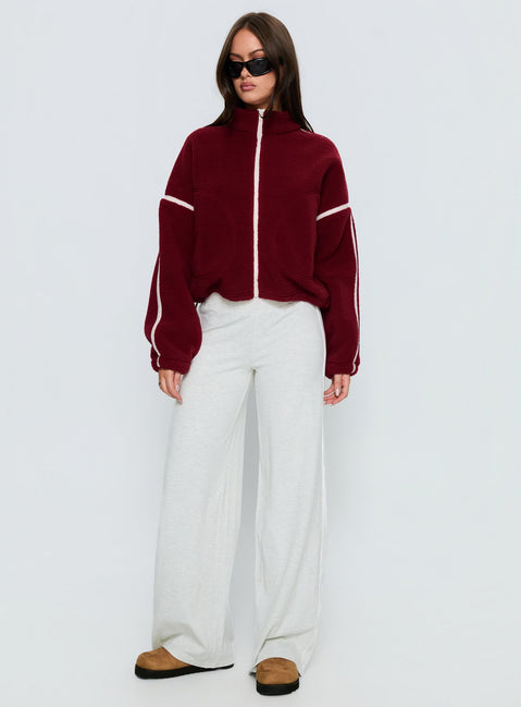 side view of model wearing Princess Polly Sammee Polar Fleece Contrast Zip Through Jacket Red Cropped Jumpers 