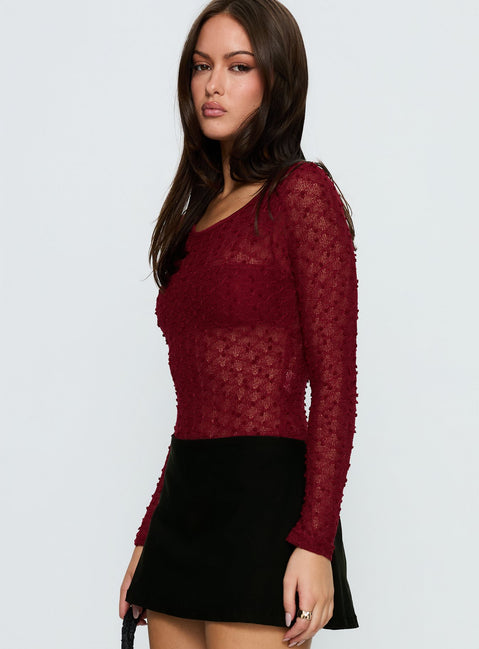 side view of model wearing Princess Polly Harly Sheer Long Sleeve Bodysuit Red Long Sleeve Tops 
