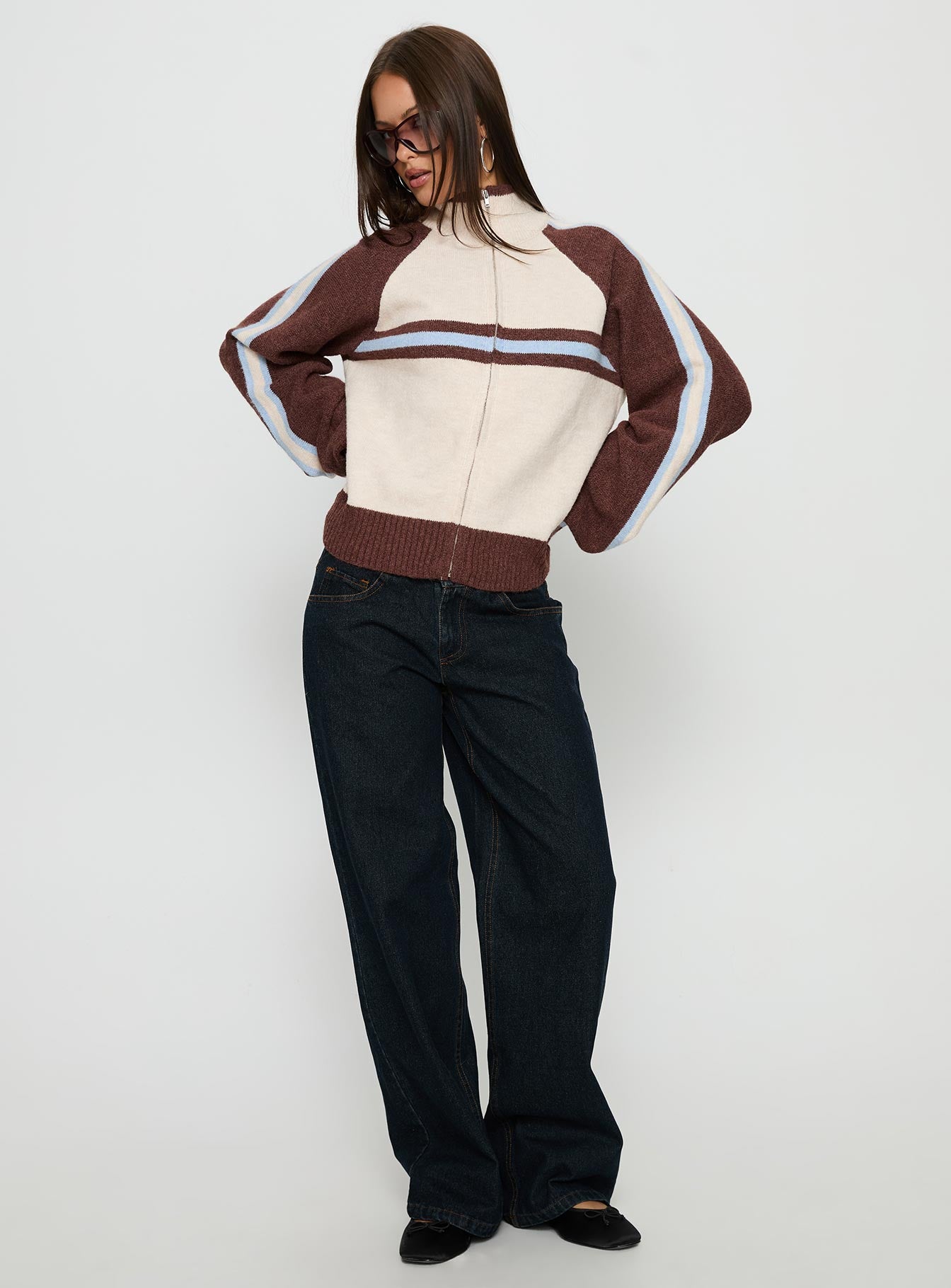 front view of model wearing Princess Polly Korinne Low Rise Bootleg Jeans Indigo Low Rise Jeans 