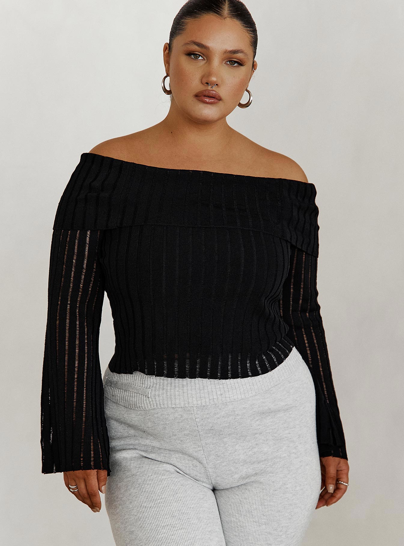 Front view of model wearing  front Princess Polly Full Sleeves Boat Neck  Sorrel Off The Shoulder Top Black Curve