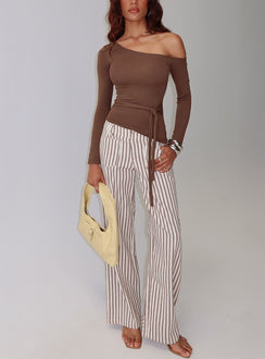 side view of model wearing Princess Polly Vendi Low Rise Pant Brown Stripe Low Rise Pants 
