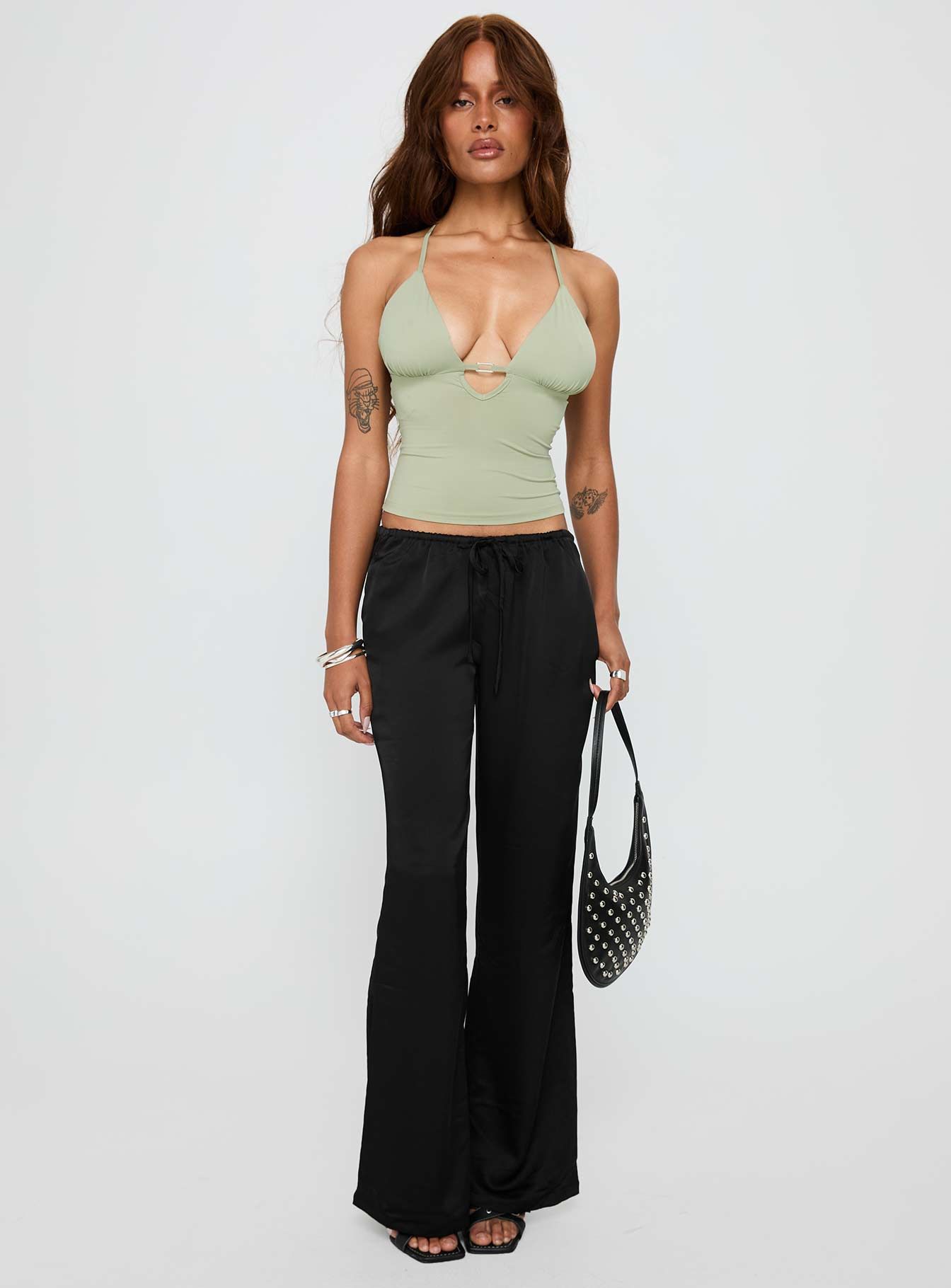 front view of model wearing Princess Polly Norwalk Plunge Neck Top Sage Sleeveless Plunger 