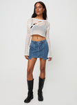 Mid wash denim mini skirt, mid rise Belt looped waist, zip and button fastening, four pockets Non-stretch material, unlined 