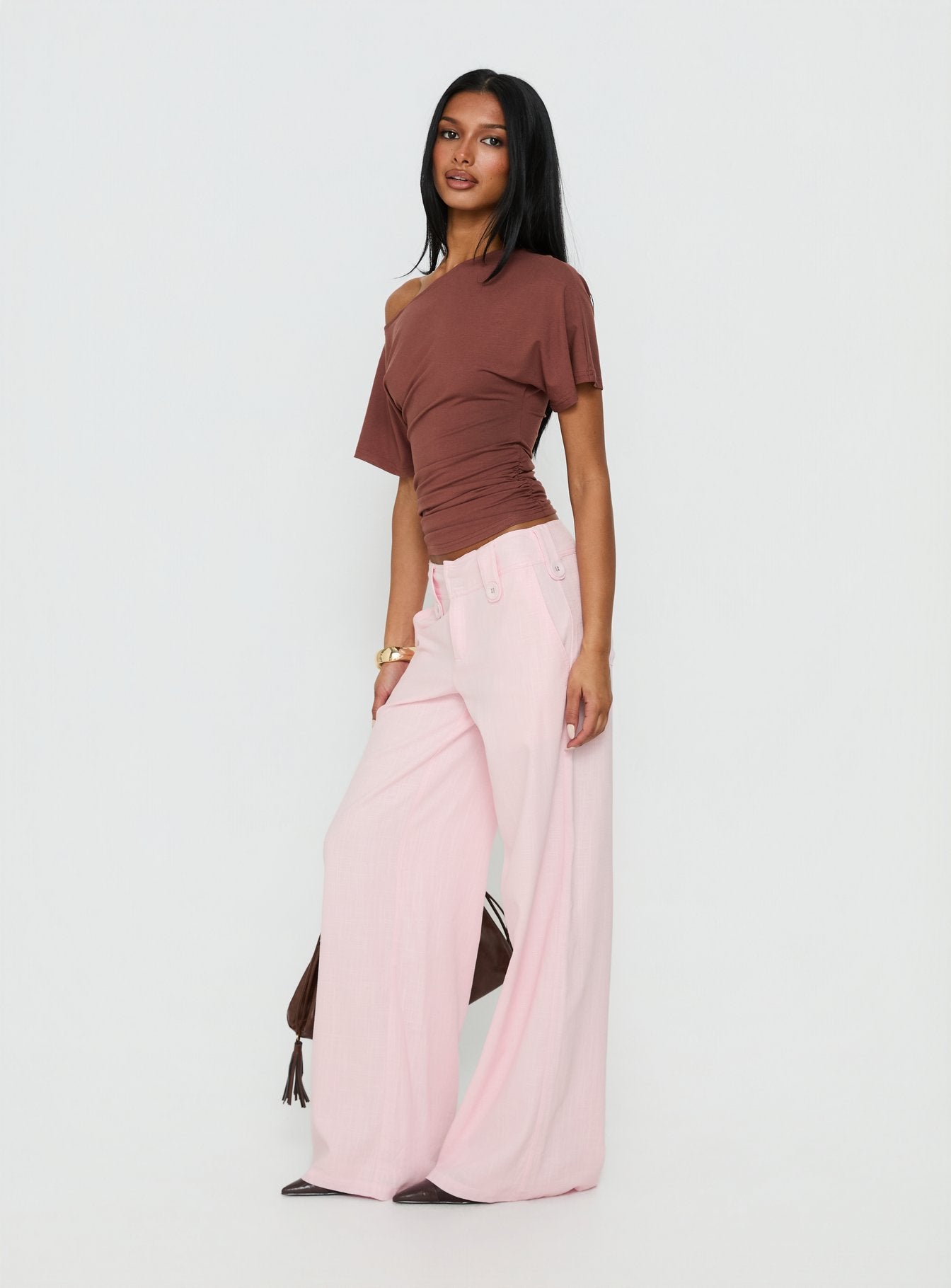 side view of model wearing Princess Polly Pedra Wide Leg Pant Pink Mid Rise Pants 