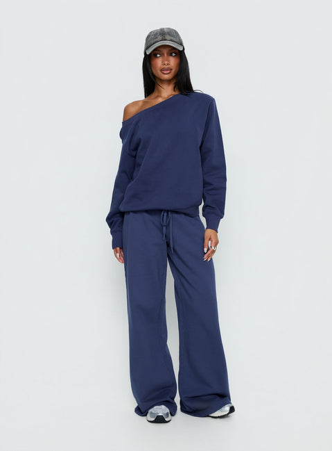 side view of model wearing Princess Polly Wellness Off the Shoulder Jumper Navy 