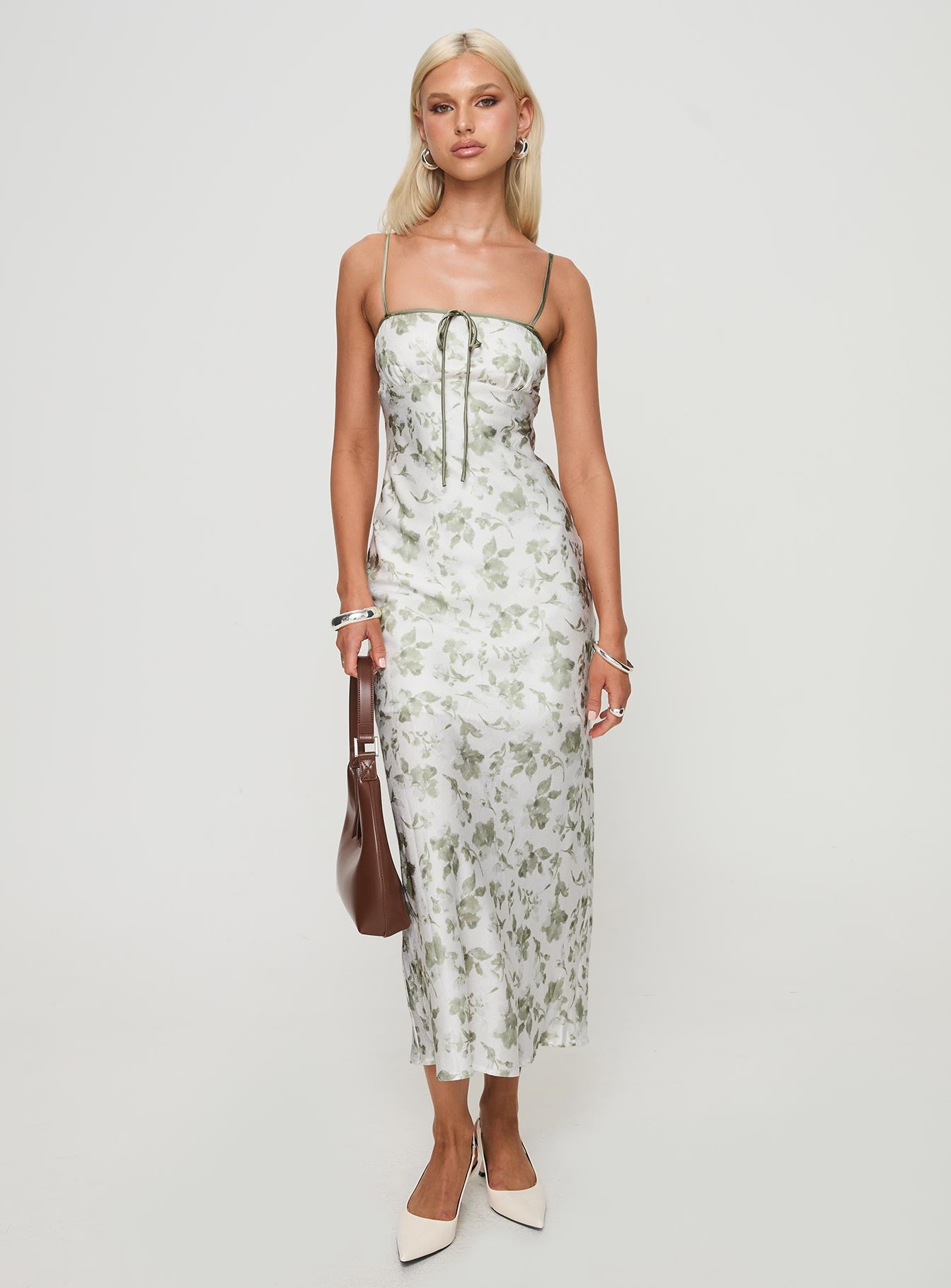 side view of model wearing Princess Polly Vasiliki Maxi Dress White / Green Floral Square Neck 