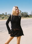 Black Knit material, high neckline, distressed detail, open back with tie fastening